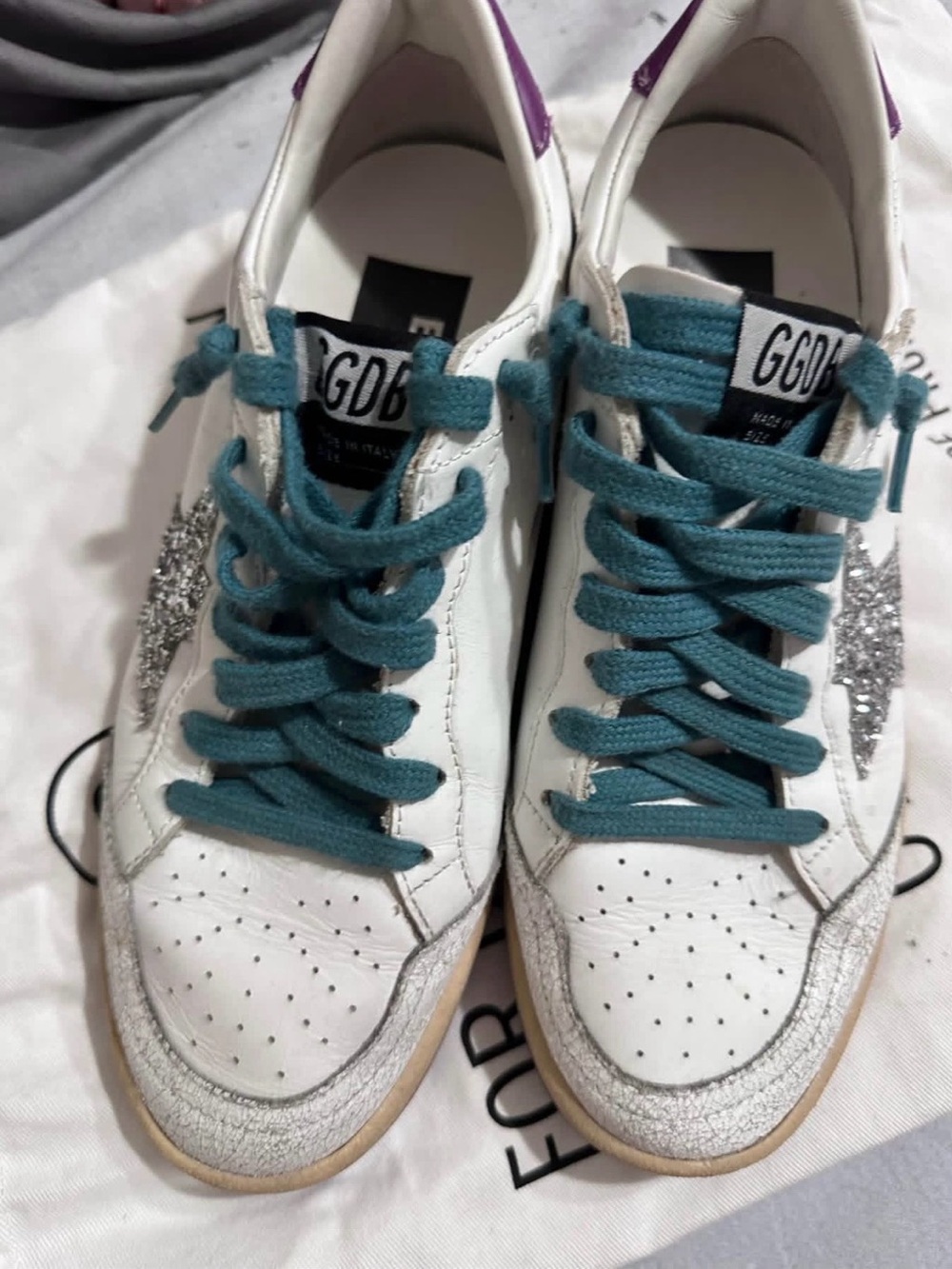 Golden Goose White Sneakers with Teal Laces and Silver Glitter Star